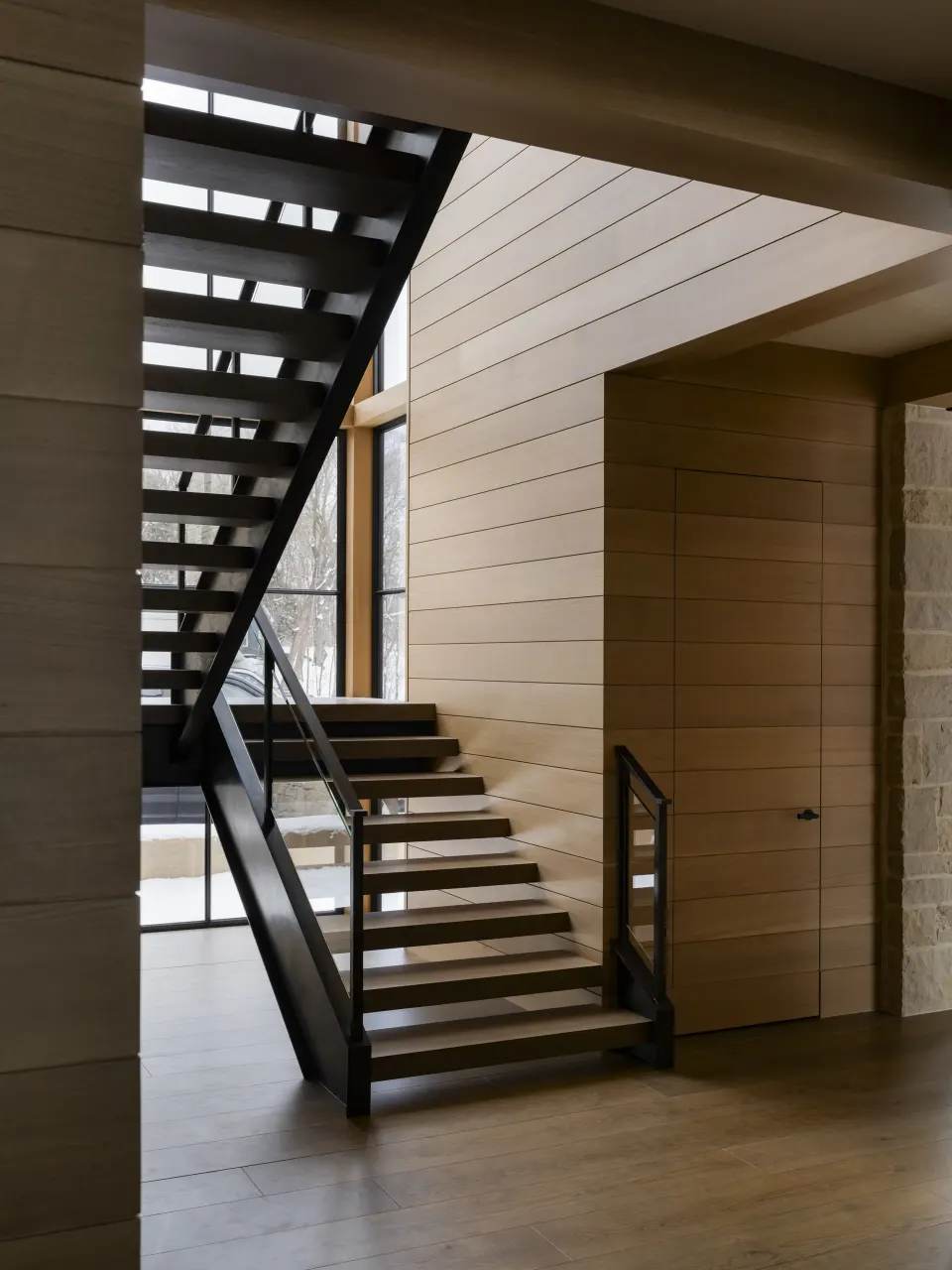 Floating white oak stair treads on steel stringers
